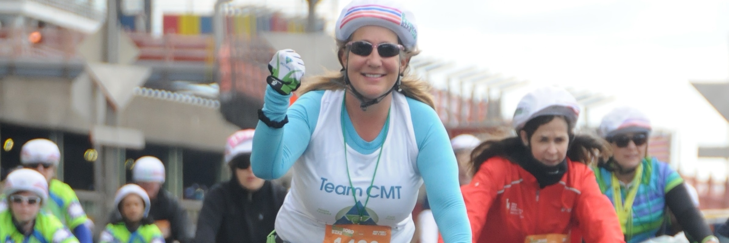 How Allison Moore Balances Cancer, Charcot-Marie-Tooth Disease allison moore riding bike in race