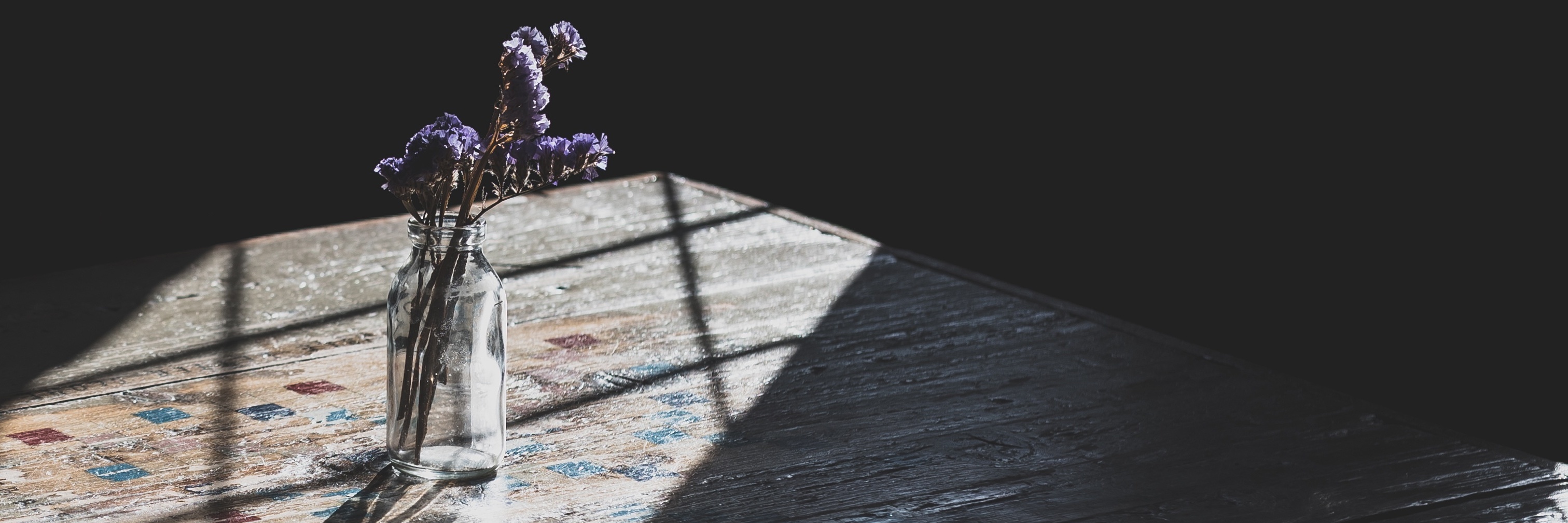 Realizing My Depression Has Made Me Feel Fragile fragile vase sitting on table in dark room bathed in sunlight