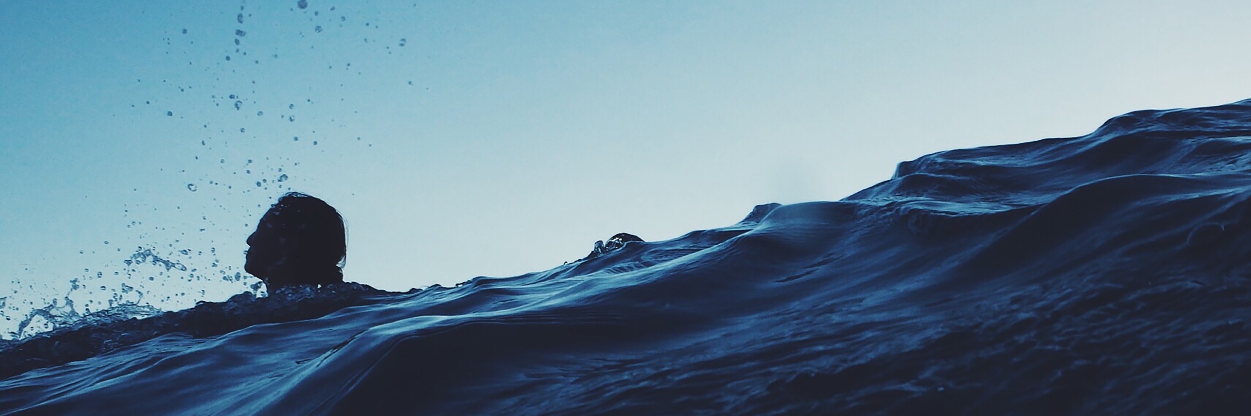 I Was Afraid of Speaking Because of Anxiety woman's head just visible above stormy waves in ocean with dark blue sky