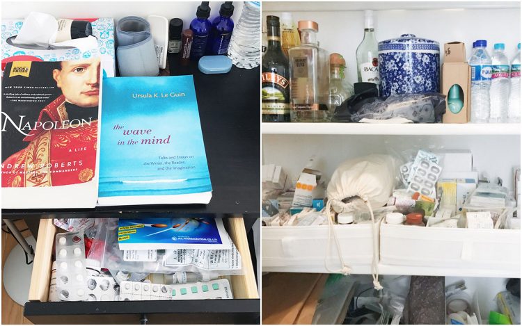 nightstand with books and medications and medicine cabinet