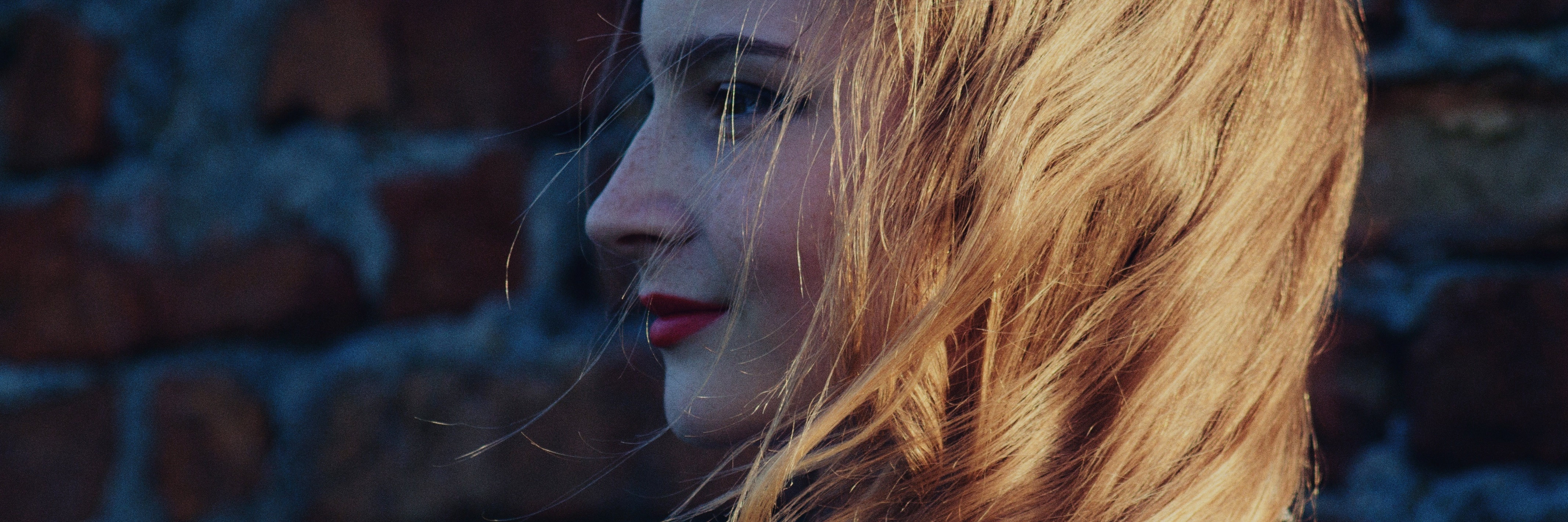 Problems Only Happy People With Depression Understand woman in profile view with blonde hair smiling