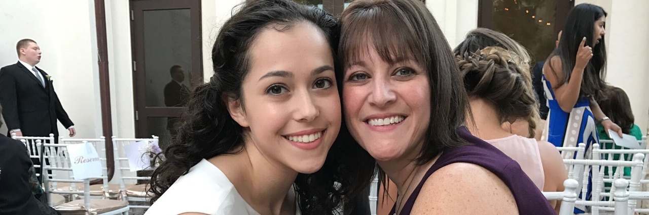 mother and daughter smiling