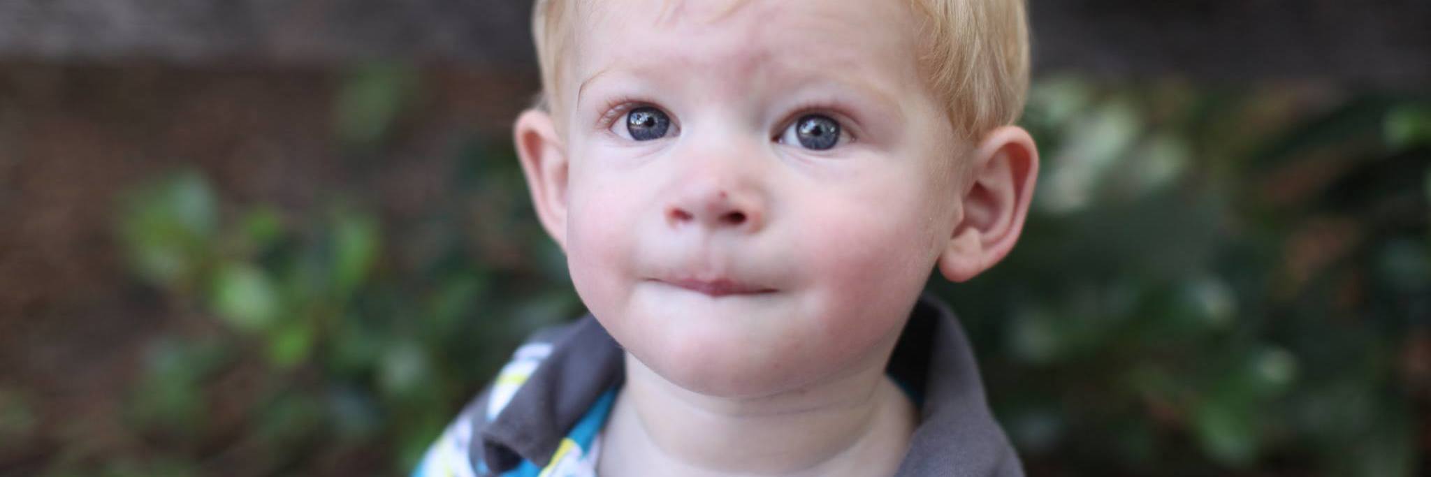 Life as a Father After Losing My Son to Congenital Heart Disease young boy standing outside