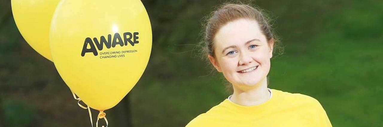 Leading a Privileged Life and Struggling with Depression the author holding balloons