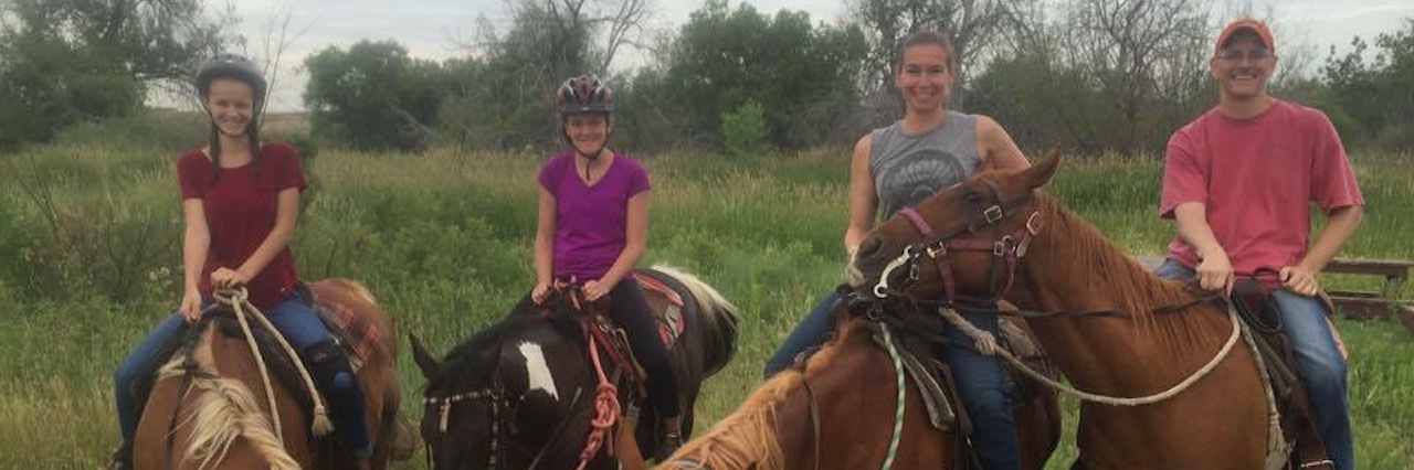 Dad With Fibromyalgia Feels Undeserving of Celebrating Father's Day family of four riding on horses