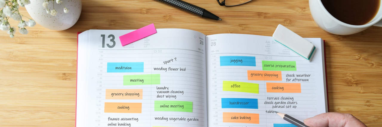 an open planner with colorful reminders