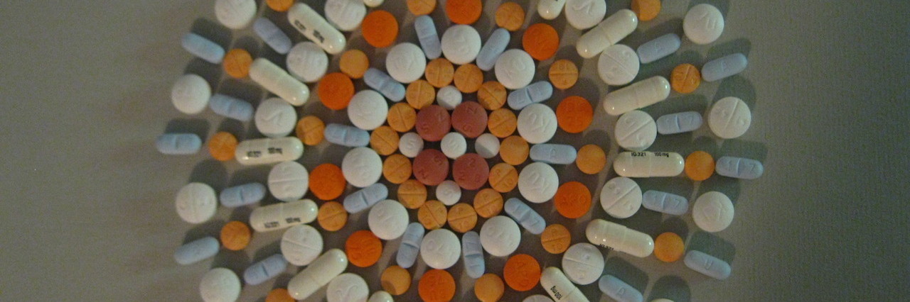 My Mental Illness Medication Trial and Error Is Exhausting Pills arranged in a circle