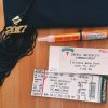 graduation tassel, ticket to ceremony and epi pen for diabetes