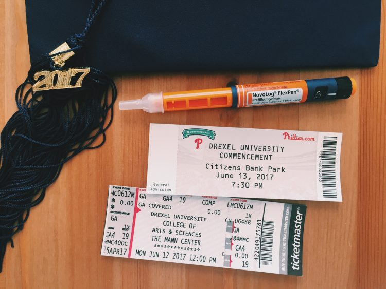 graduation tassel, ticket to ceremony and insulin pen for diabetes