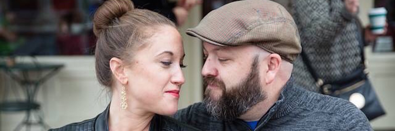 How Chronic Pain Made Me Feel Unworthy of Love A photo of the writer and her husband, having coffee.