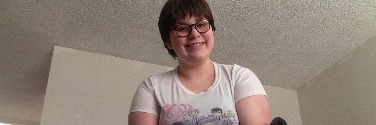 When a Doctor Wants You to Be 'Regular' Again With Chronic Illness photo of a woman smiling and sitting in her wheelchair