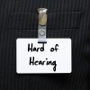 Tag on suit that says "hard of hearing."