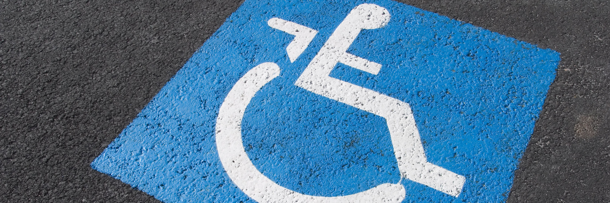 How Disability Symbol Excludes Those With Invisible Illness disability symbol in parking space