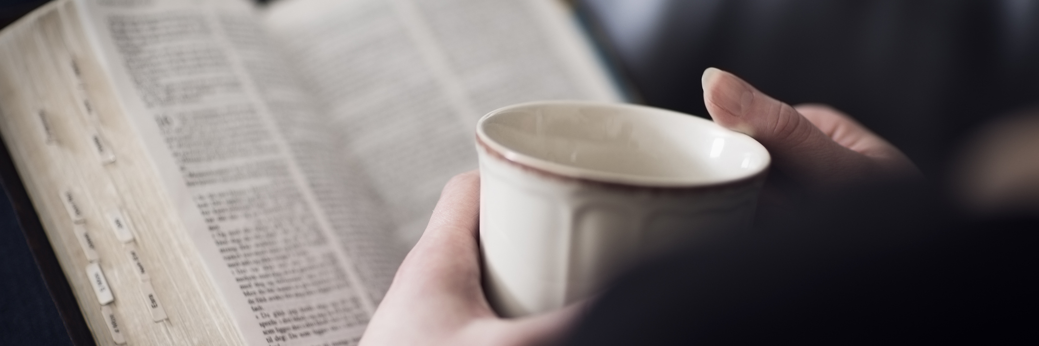 Achieving Wellness With a Chronic Illness woman drinking coffee and reading