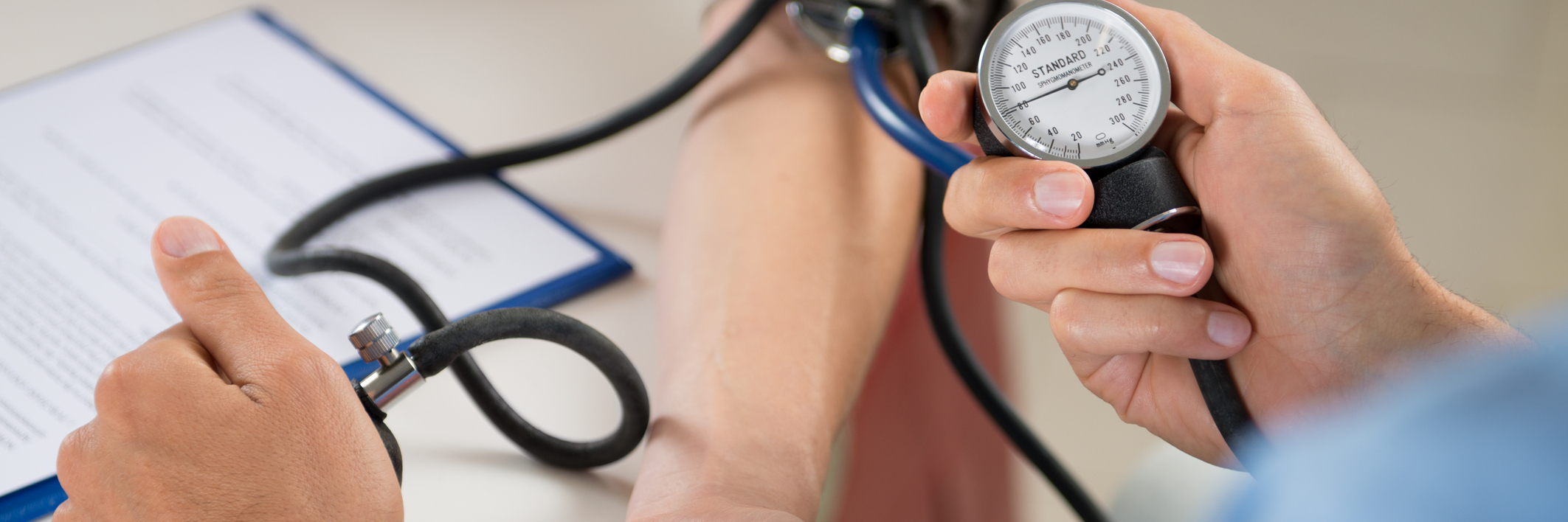 Conditions Doctors Will Try to Test for Besides Lyme Disease doctor measuring a patient's blood pressure