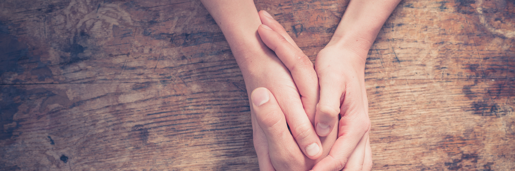 Erdheim-Chester Disease: How to Help a Friend With a Rare Illness a person holding their friend's hand in support