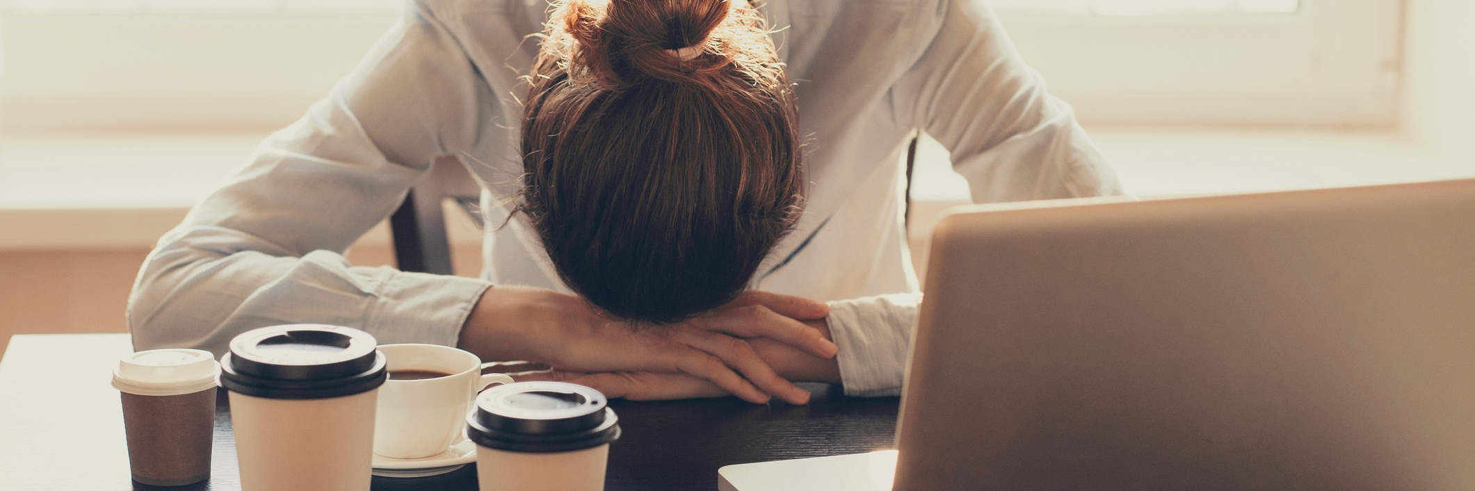 Fearing Pain and Loss With Fibromyalgia woman sleeping at her desk