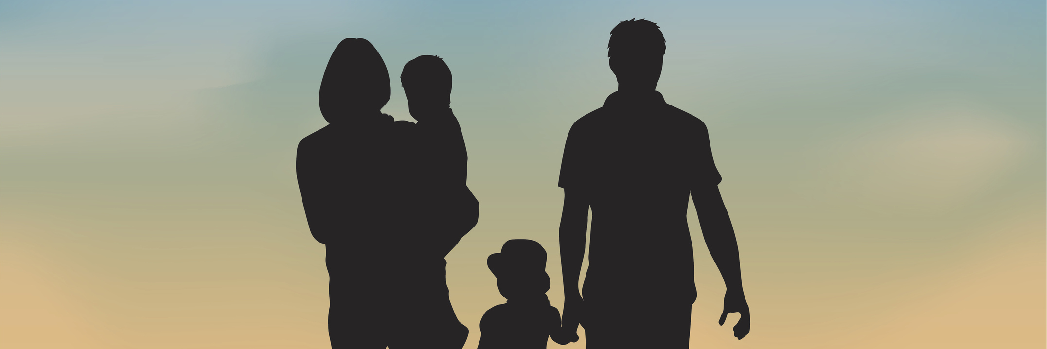silhouette of family of four walking outside