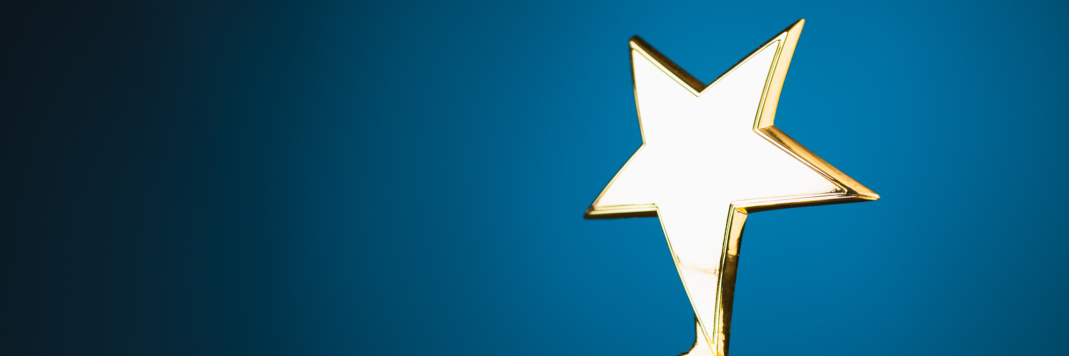 My Anxiety Makes Me Feel Like I Always Have to 'Be the Best' shiny gold star trophy against blue background with copy-space