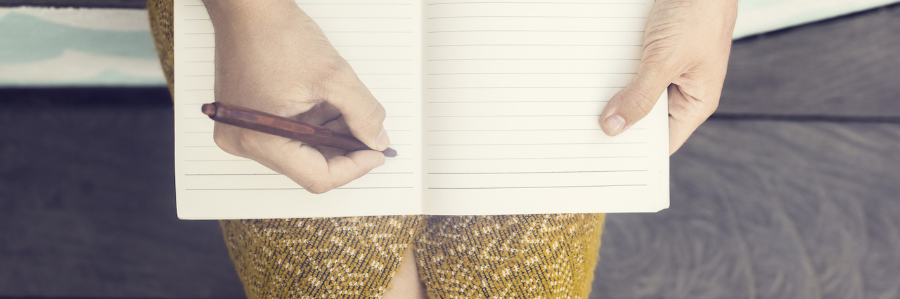 For the People Who Don't Understand Depression girl writing in her journal
