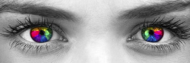 Gaining A New Perspective And Identity After Lyme Disease Treatment Black And White Photo Of A Woman S Face With Her Eyes Colored Rainbow
