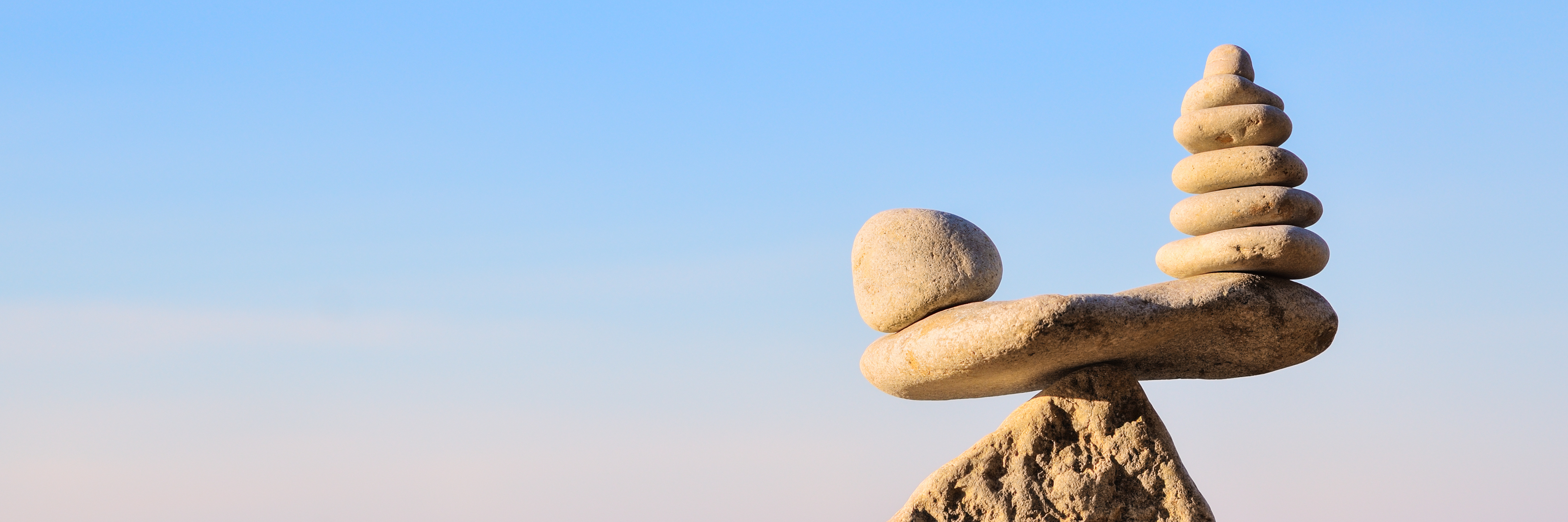 Finding a Balance Between Good and Bad Days With Chronic Pain stones balancing on top of each other