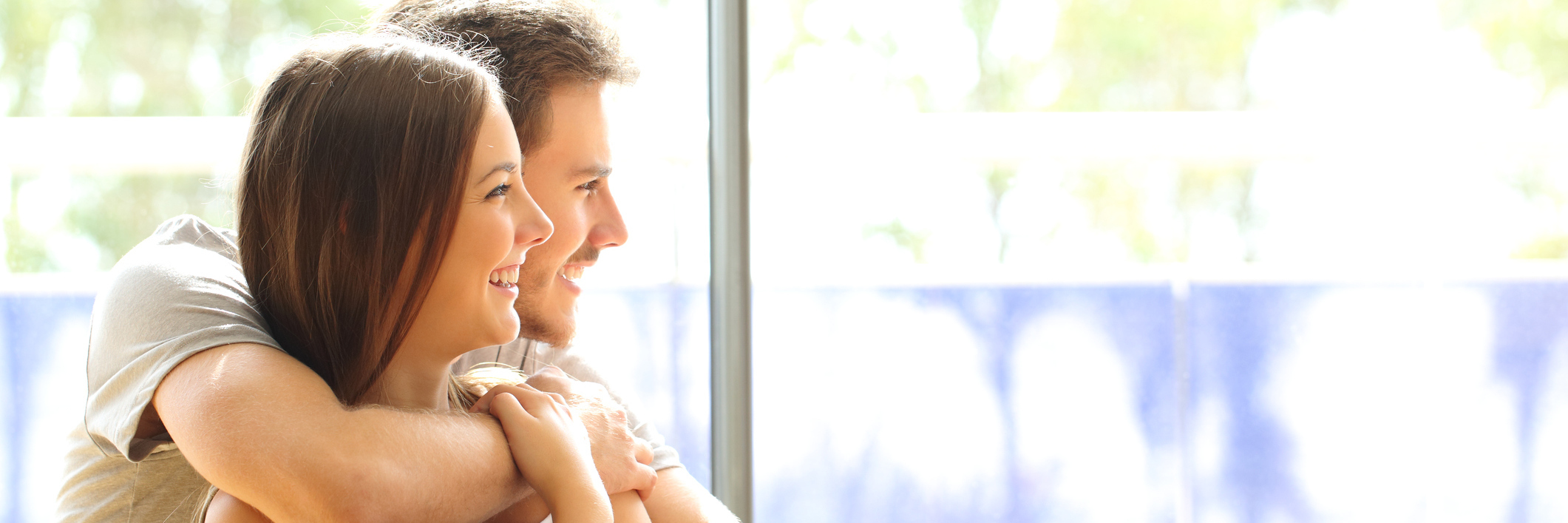 Being Reminded It's OK to Rest When You're Tired With Chronic Illness husband and wife hugging and laughing