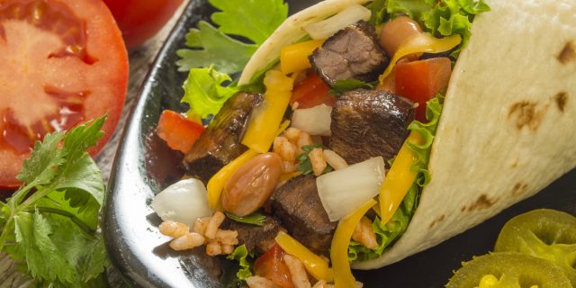 How My Life With Asperger's Is Like an Overstuffed Burrito This burrito looks very tasty with beef, peppers and melted cheese. And now people with screen readers, you can join in being hungry.