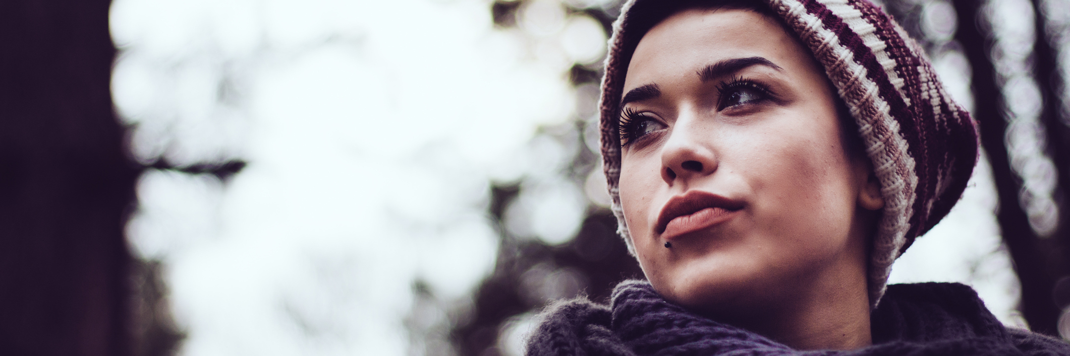 10 Things That Can Inadvertently Hurt People With Chronic Illnesses woman looking towards trees