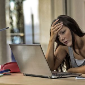 Frustrated student at computer.