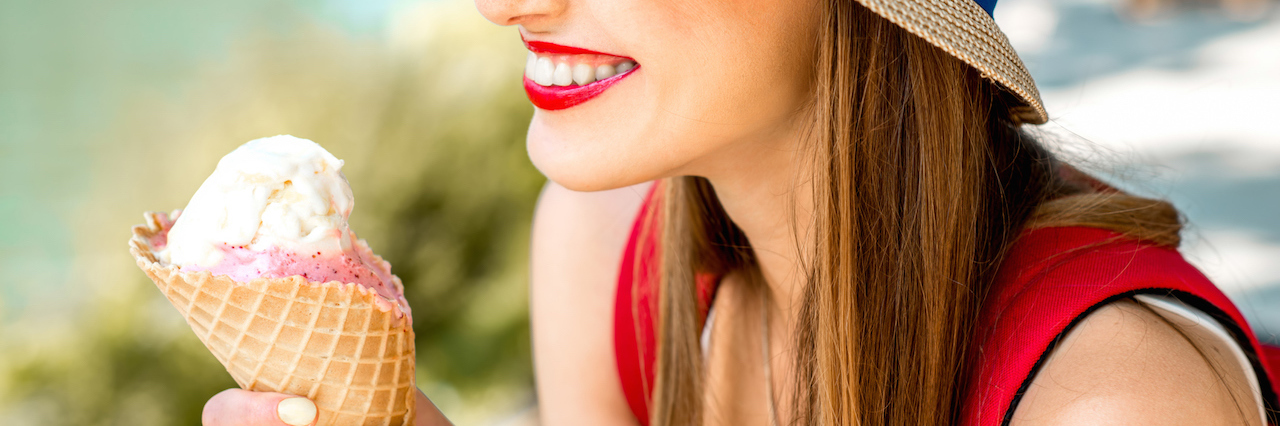 Eating Disorder Recovery Win at Grocery Store A woman enjoying an ice cream cone