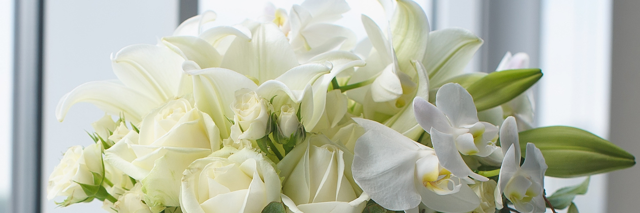 The Last Time I Saw My Father, and the Gift He Left Me Bouquet of white flowers in glass vase on windowsill