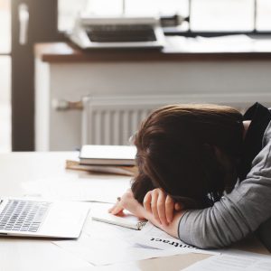 woman asleep at desk