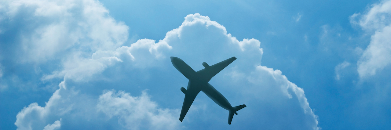 Traveling Abroad in Eating Disorder Recovery plane in the sky