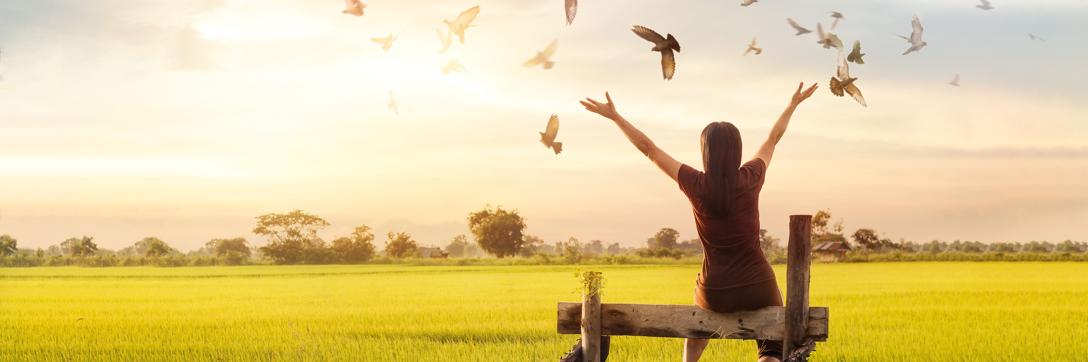 Having Hope When You Struggle With Chronic Illness, Mental Health woman sitting on a fence outside at sunset