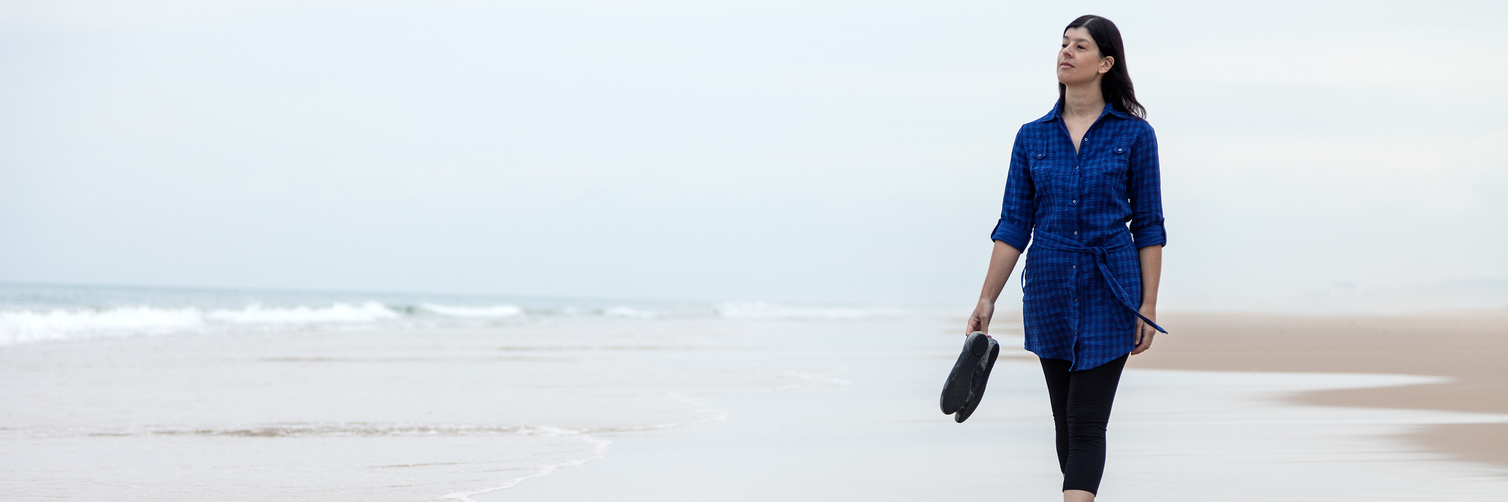 Not Feeling In Control of Life or Destiny With Fibromyalgia woman walking alone on the beach