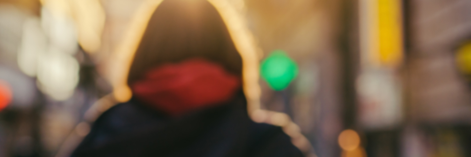 My Experience With Degenerative Disc Disease and Chronic Pain Blurred photo of woman on city street