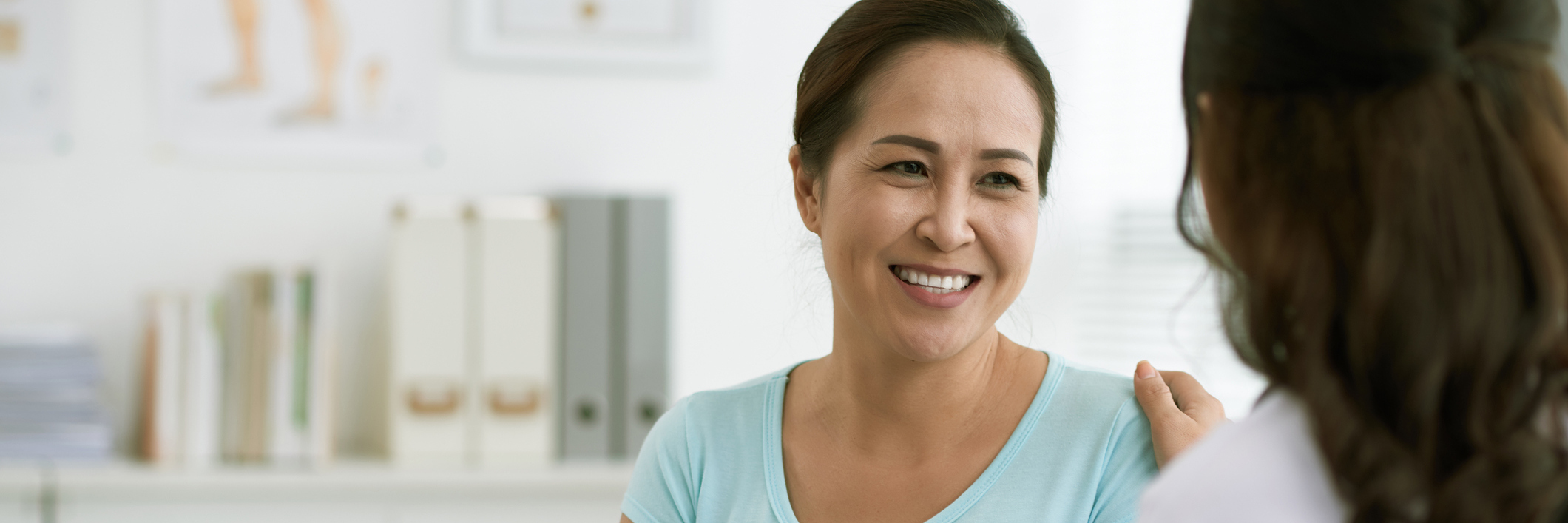 How to Prepare for and Make Medical Appointments Stress-Free female patient talking to her doctor