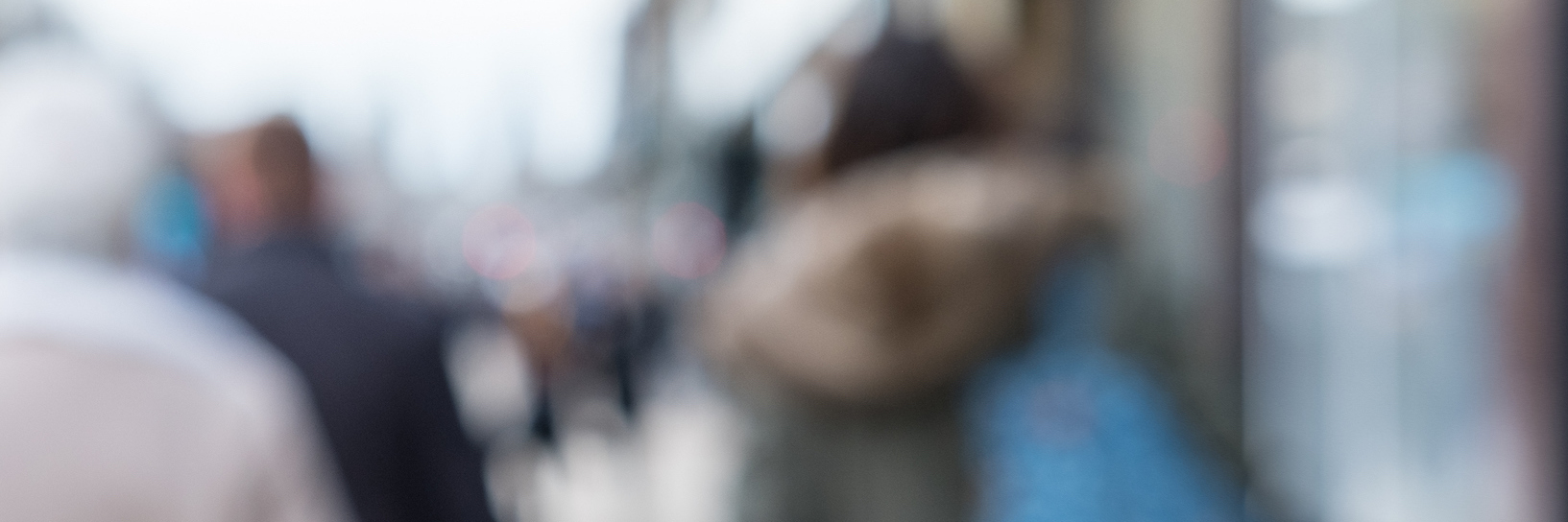 Grief: Going Out in Public After Losing Someone You Love Blurred image of People walking on the street