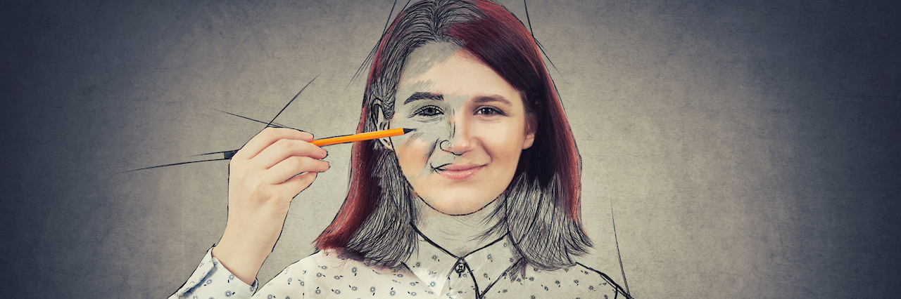 Searching For My Identity in My Eating Disorder A woman drawing a picture of herself