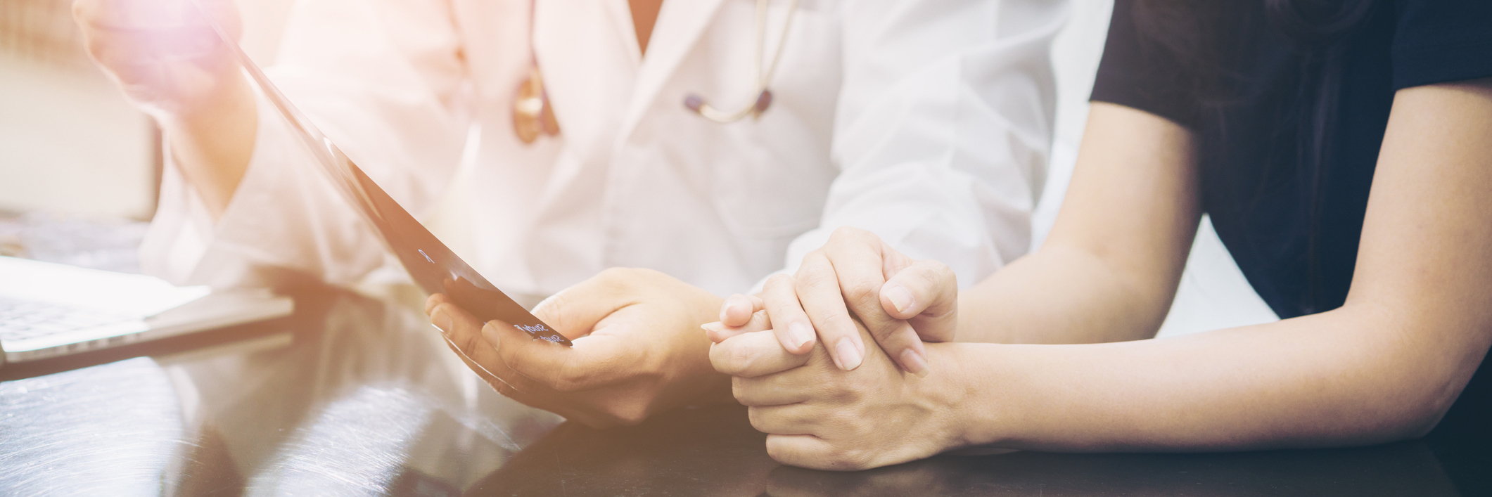 What It's Like to Be a Patient With a Rare Condition doctor showing a patient test results