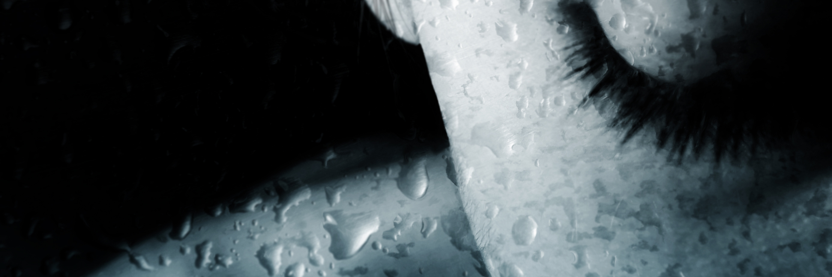 4 Things I Wish Others Understood About Life With a Chronic Illness Woman with drops of rain covering her skin.