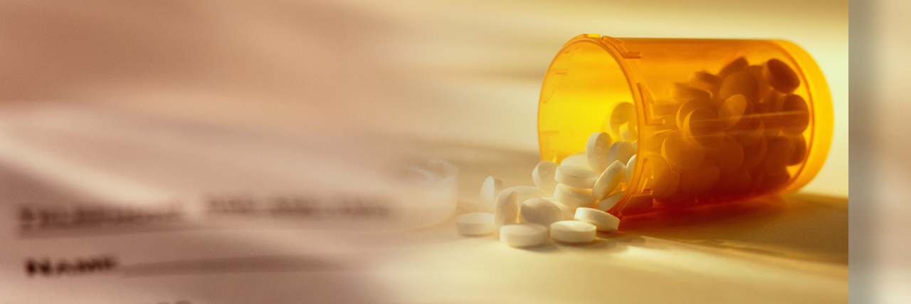 6 Honest Truths I Wish I Could Tell My Psychiatrist bottle of pills spilling on the table