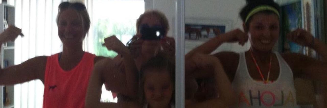 Trying to Reduce Exhaustion and Fatigue of Chronic Illness several women standing in front of a mirror and flexing their biceps