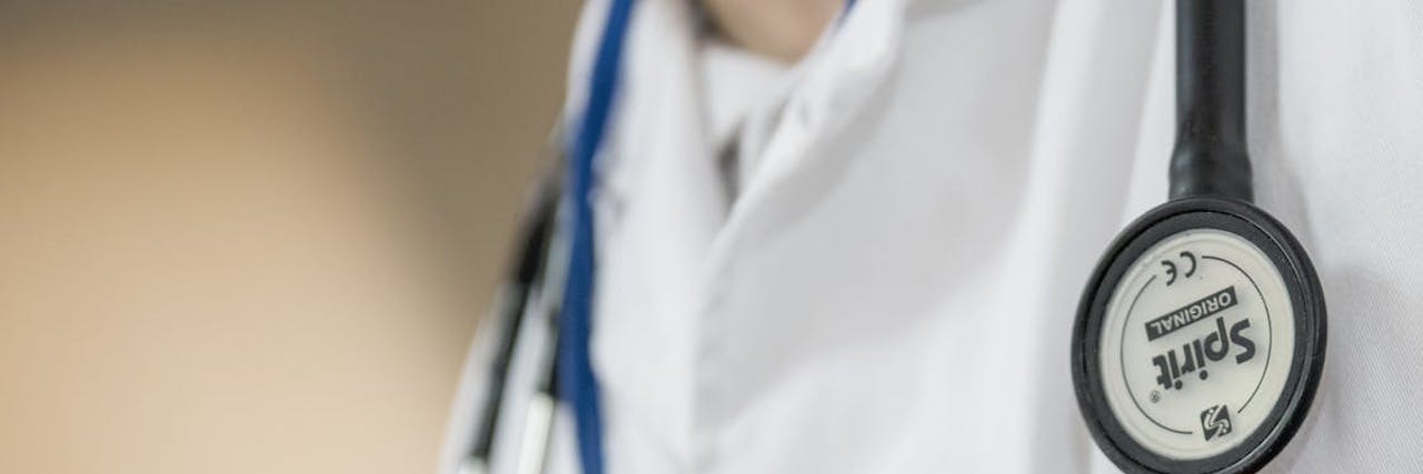 Severe Allergies to Foods and Touch, Disbelieved by Doctors doctor's lab coat with stethoscope
