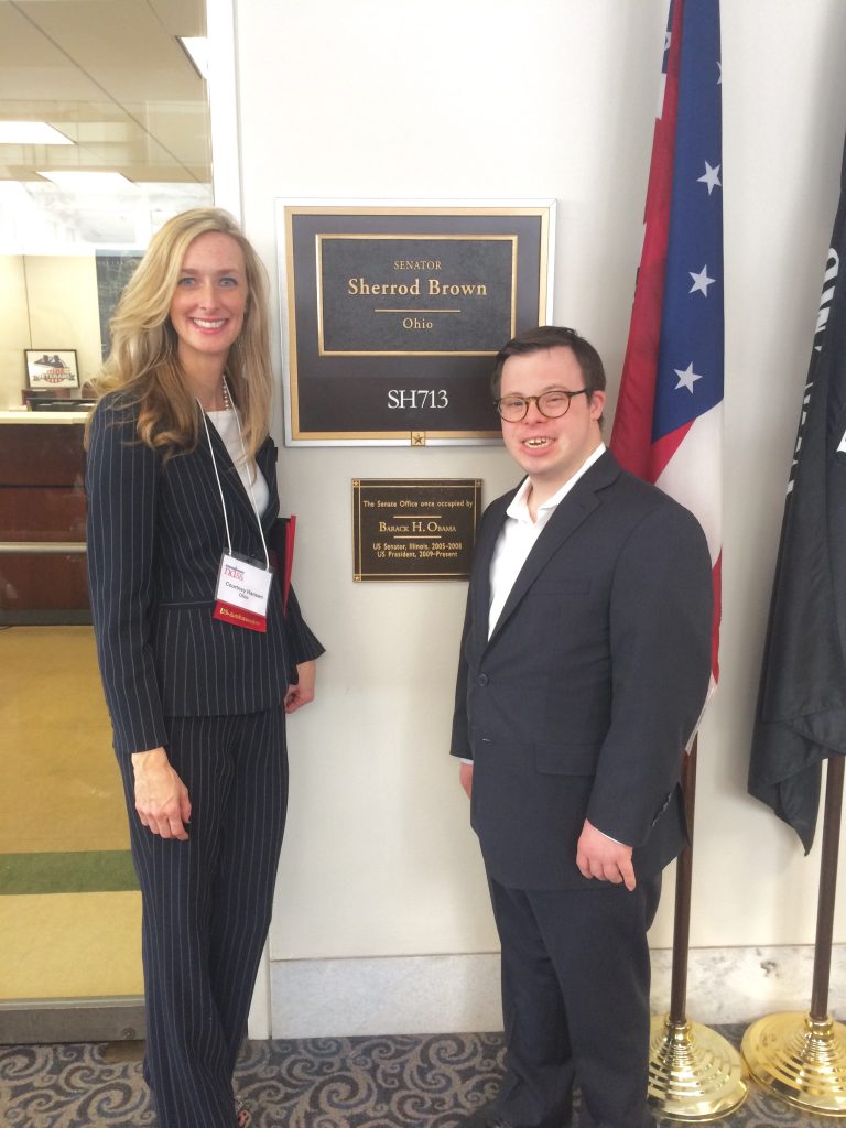 Courtney and her son outside their senator's office.