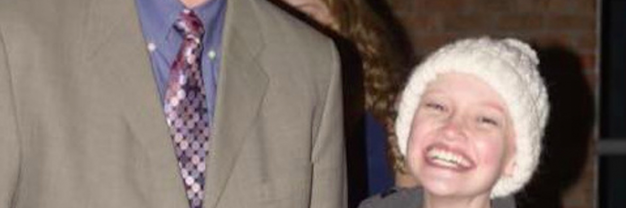 What's Behind the Mask of a Cancer Dad? The author with his daughter, both smiling