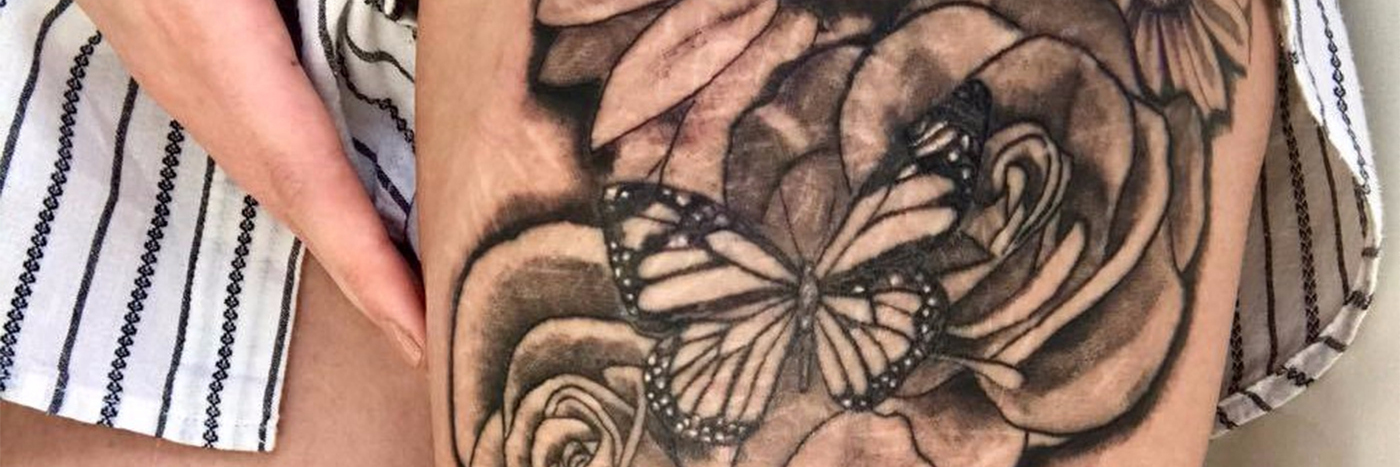 floral tattoos covering self-harm scars
