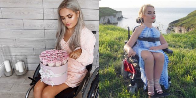 Jordan Bone sitting in a wheel chair in a white dress. Tess Daly sitting in a wheel chair in a blue dress, in a green field