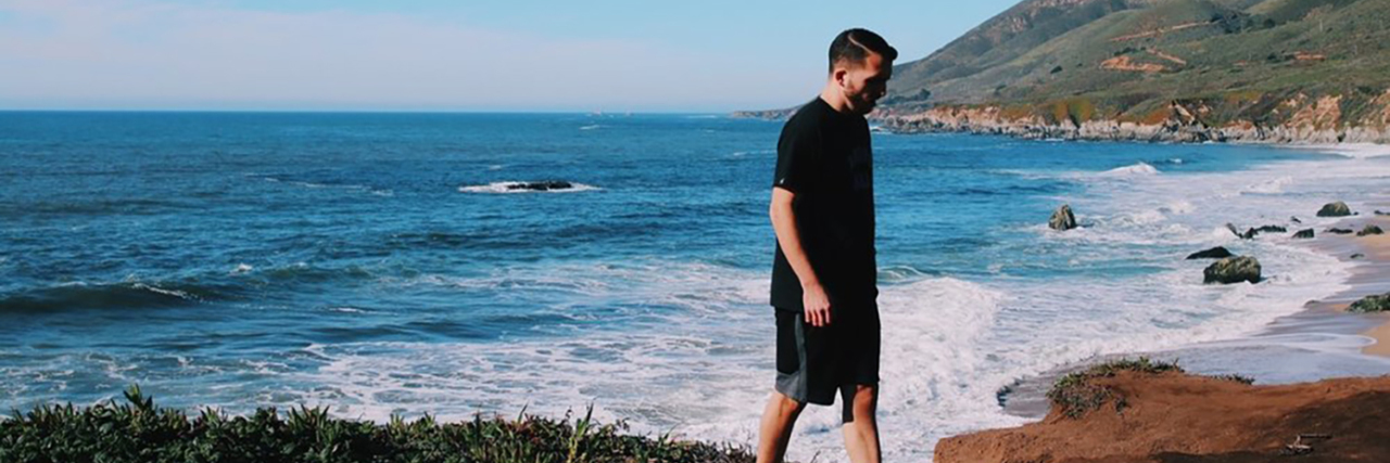 My Life With a Limb Difference Max Pete walking on the beach.